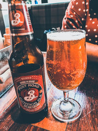 Close-up of beer glass on table