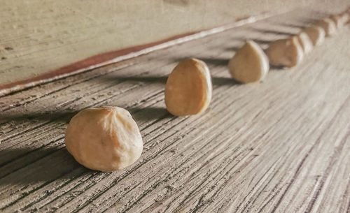 Close-up of bread on wooden table