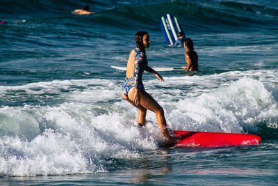 People enjoying in sea