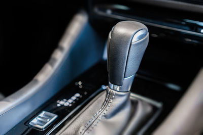 Close-up of gearshift in car