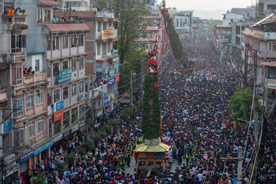 Devotees pull chariots as they take part in the festivities to mark the rato machindranath chariot.