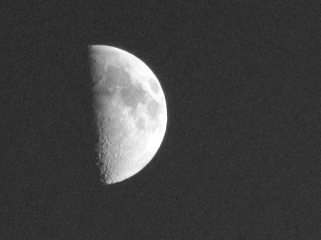 LOW ANGLE VIEW OF MOON IN SKY