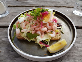 High angle view of salad in bowl on table