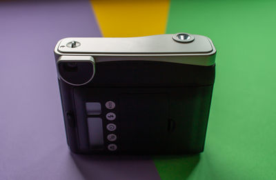 Close-up of camera on table