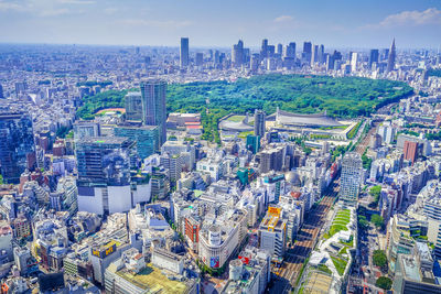 Aerial view of cityscape against sky