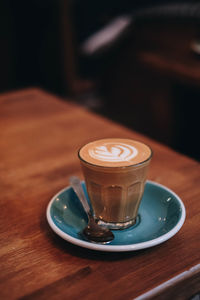 Close-up of coffee cup on table