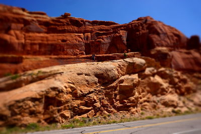 Rocks in desert against clear sky