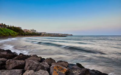 Scenic view of sea against clear sky