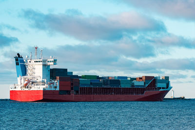 Ship in sea against sky