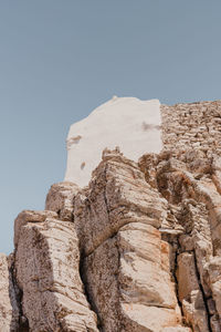 Rock formations against clear sky