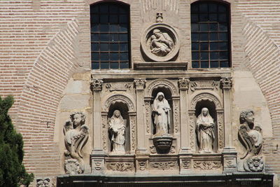 Low angle view of statues on building