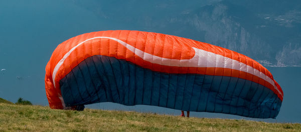 Parachute on grassy mountain