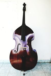 Close-up of guitar against white background