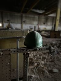 Close-up of old machine part of abandoned building