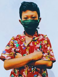 The boy with green mask