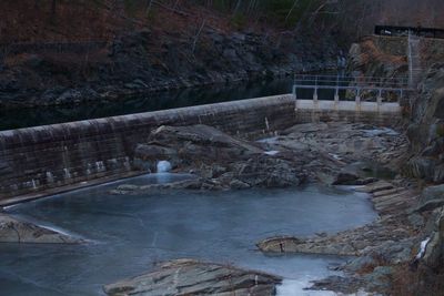 High angle view of dam by river