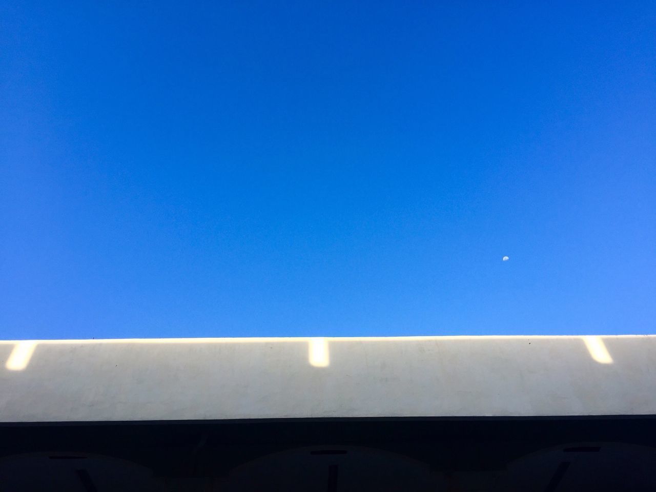 LOW ANGLE VIEW OF AIRPLANE AGAINST SKY