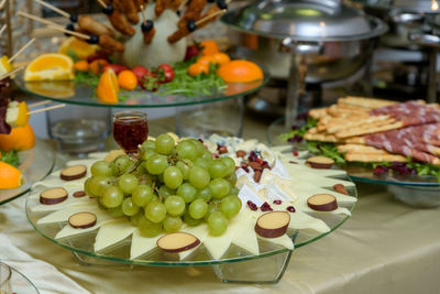 Close-up of fruits in plate on table