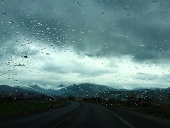 Road seen through car windshield