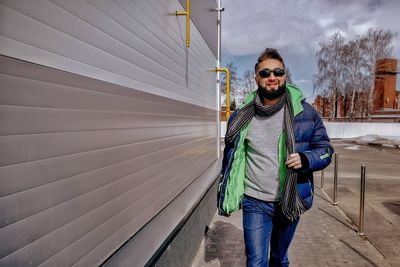 Portrait of young man standing outdoors