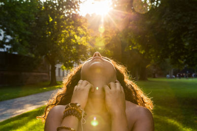 Close-up of woman at park