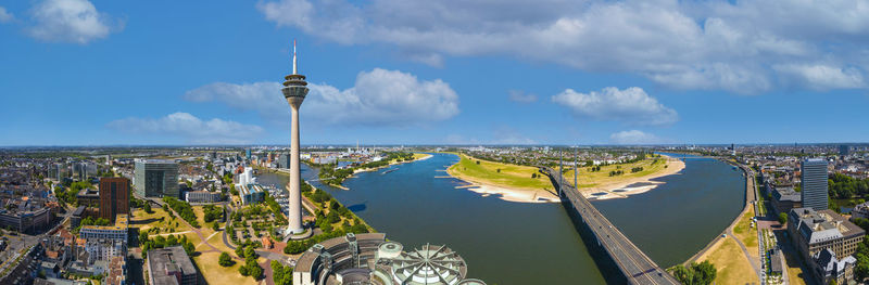 Panoramic view of modern buildings against sky