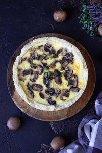 Savory tart, pie or quiche with mushrooms and cheese. homemade savory autumn bakery.