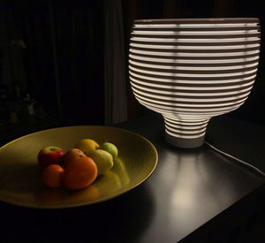 Close-up of fruits in bowl on table at home
