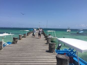 Scenic view of sea against clear blue sky