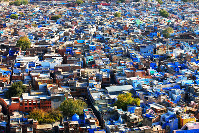 High angle view of buildings on sunny day in city