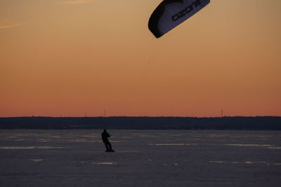 View of people at sunset