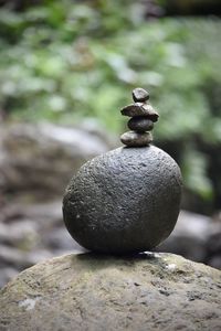 Close-up of stone stack on rock