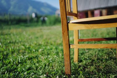 Close-up of chair on field