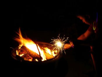Close-up of illuminated bonfire at night