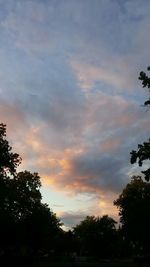 Scenic view of landscape against cloudy sky