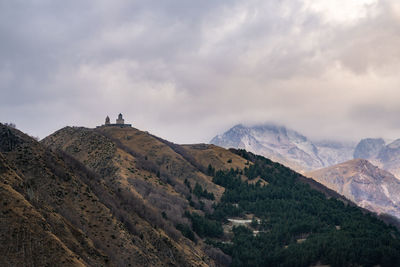 Scenic view of mountains against sky stepantsminda, georgia