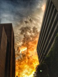 Low angle view of building against cloudy sky