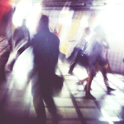 Blurred motion of people in shopping mall