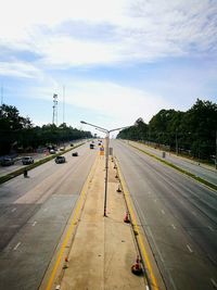 High angle view of road in city against sky