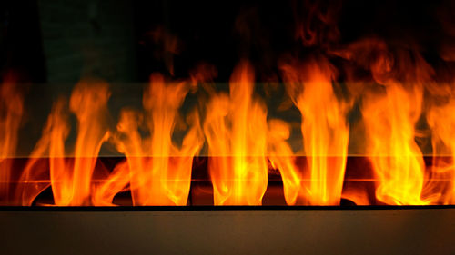 Close-up of yellow fire at night