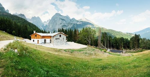 Mountain cottage panorama and croz of the altissimo mountain, croz dell'altissimo. trentino, italy