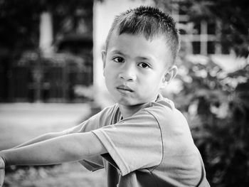 Portrait of boy in yard