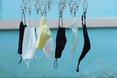 Close-up of clothes hanging on clothesline