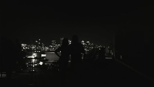 People playing lit up at night
