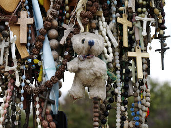 Close-up of stuffed toy hanging for sale