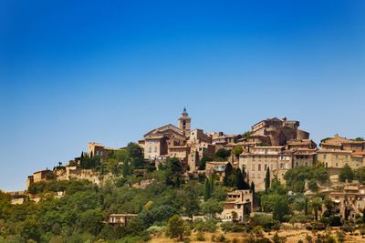 Buildings against blue sky