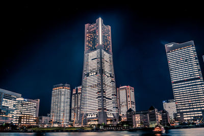 Skyscrapers in city at night