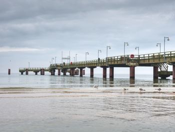 Traditional wooded bridge pier with nobody against dusky sky use for natural background