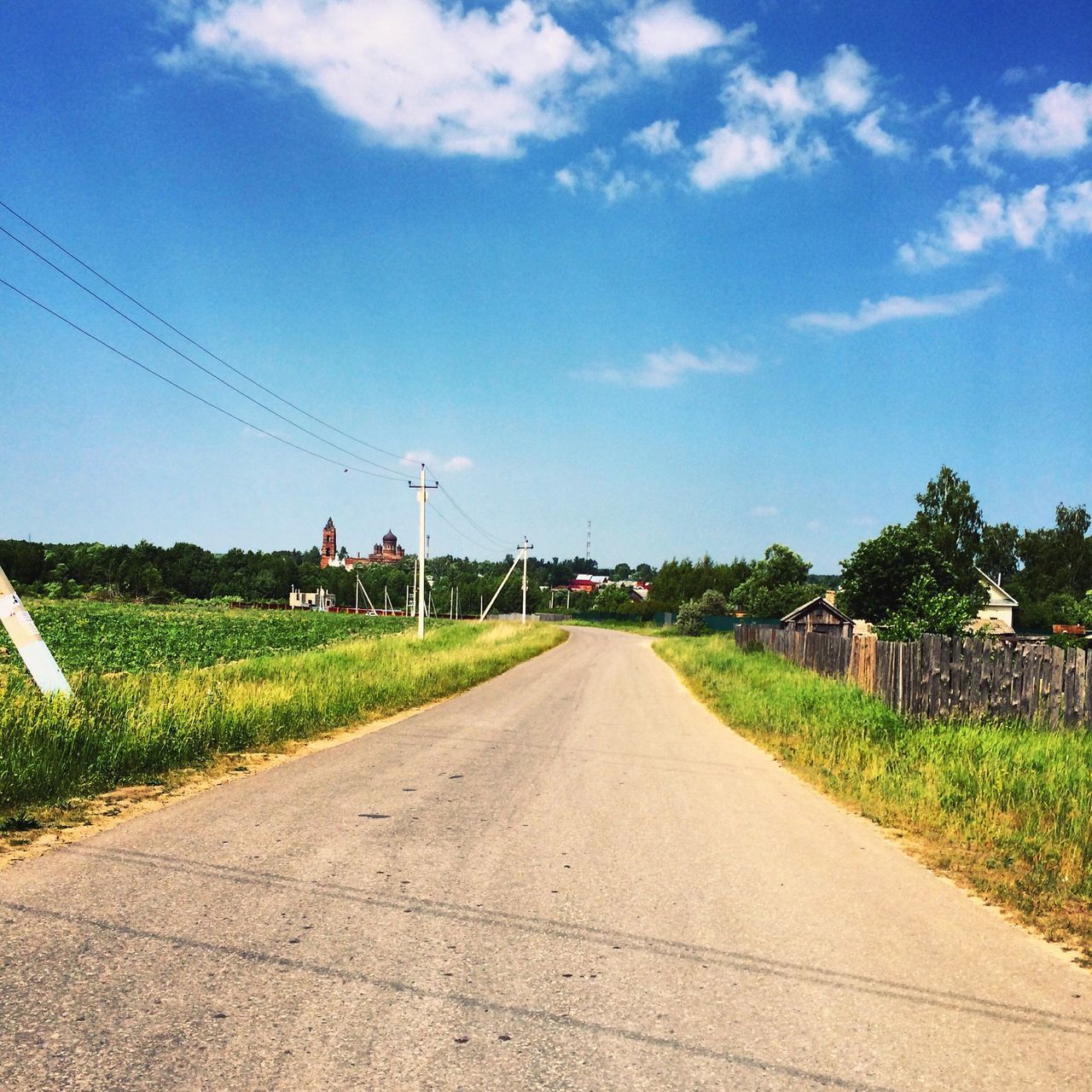 the way forward, diminishing perspective, sky, transportation, vanishing point, road, landscape, field, country road, rural scene, empty road, cloud - sky, electricity pylon, grass, tranquility, tranquil scene, tree, cloud, empty, long