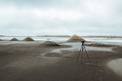 Scenic view of beach against sky